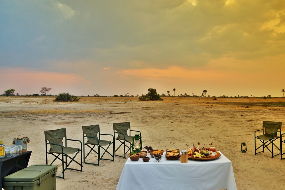 Enjoy a sunset out in the open at Kazuma pan whilst staying at Wildtrack Safari Eco lodge