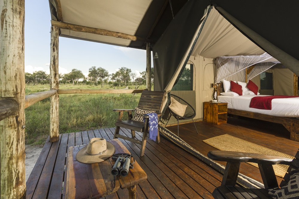 Enjoy the views from your private deck or your bed at Mogogelo camp