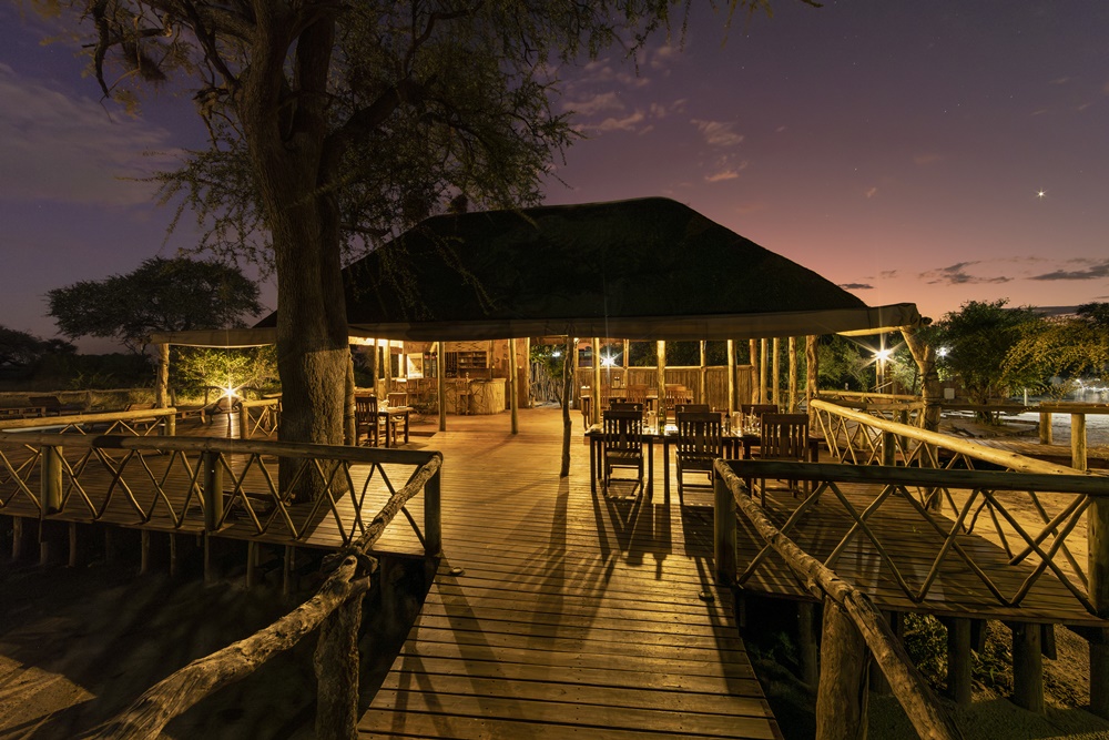 The main area at night waiting for you at Mogogelo camp